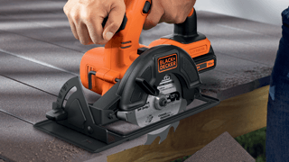 A Black + Decker Saw A Black + Decker Saw