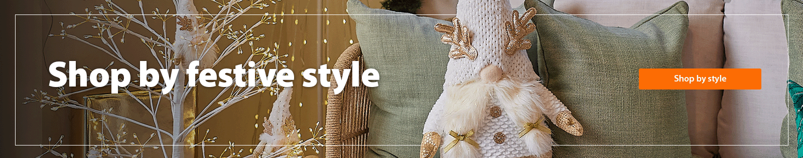 A heading 'Shop by festive style' accompanied by a room with beautiful Christmas decor and a Christmas tree with modern decorations and warm white lights