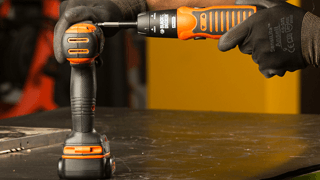 A Black + Decker Screwdriver A Black + Decker Screwdriver