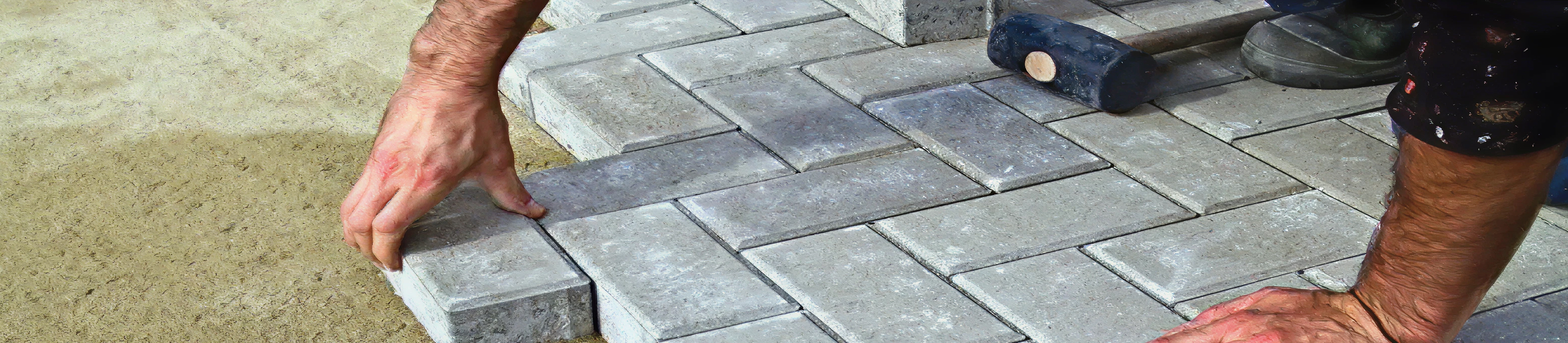 Laying Firth concrete pavers 