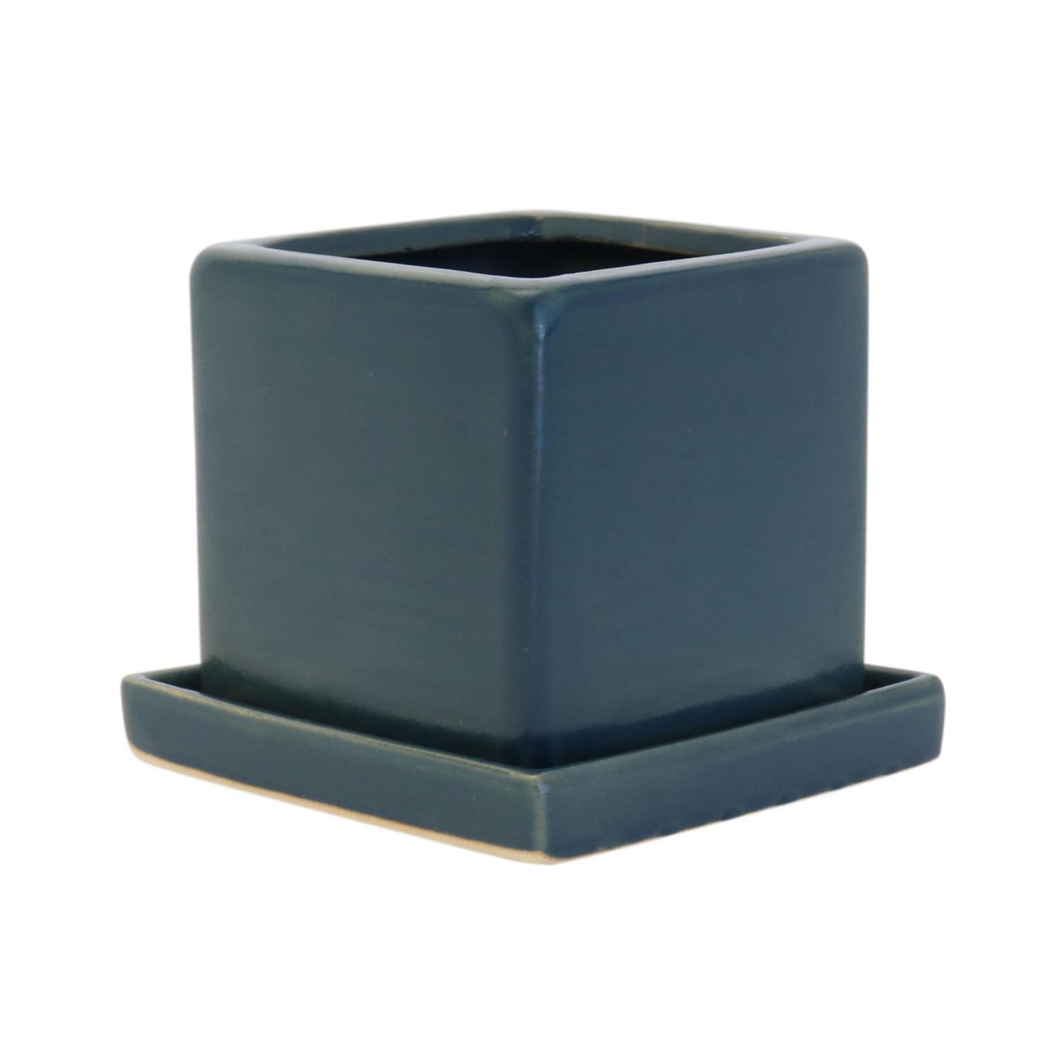 Glazed cube and saucer